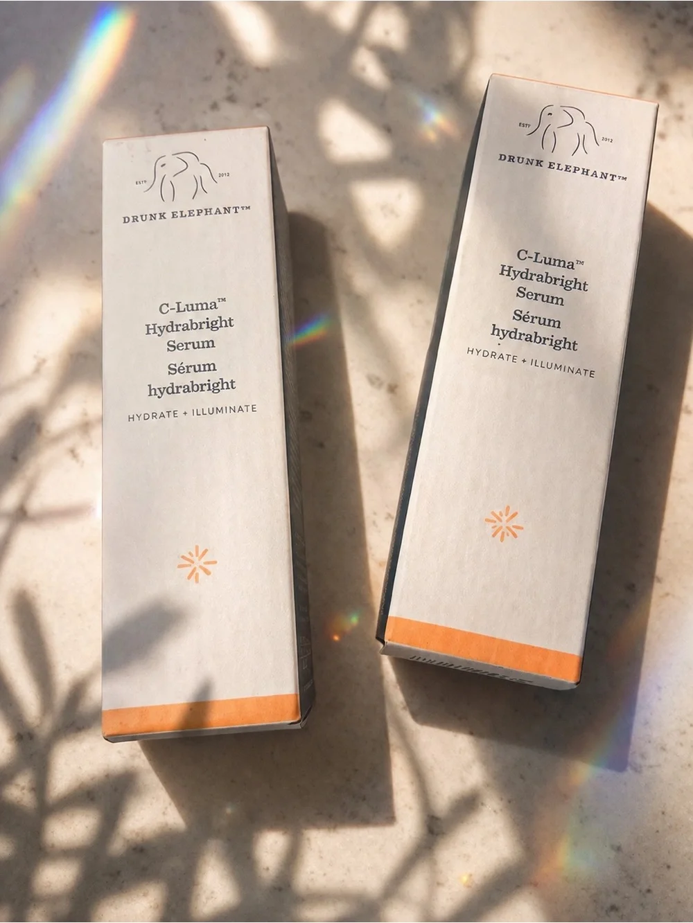 Drunk Elephant C-Luma HydrabrighT Serum — cream packaging with orange accent